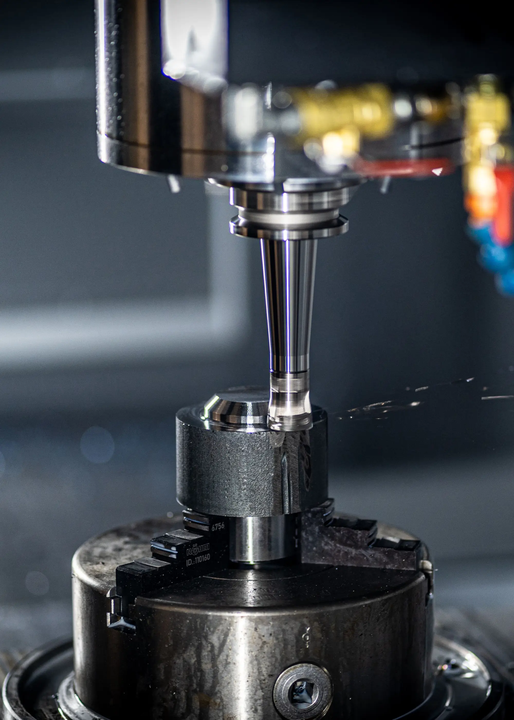 CNC milling machine precisely machining a metal component.